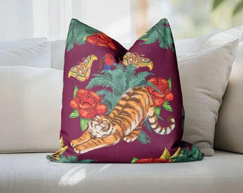 a pillow with a tiger on it on a couch