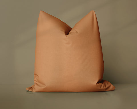 Caramel Drizzle Adobe solid throw pillow cover, medium brown