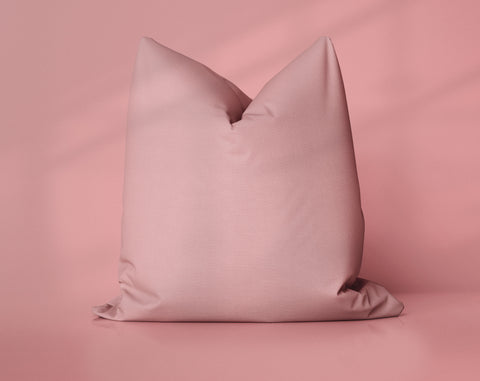Dusty Rosehip Mauveglow solid throw pillow cover, medium red